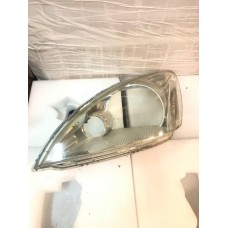 Headlight glass Left for Mitsubishi Lancer 9 since 2003 Used, Original